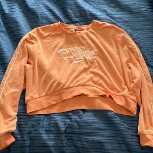 Orange Nike crop long sleeve